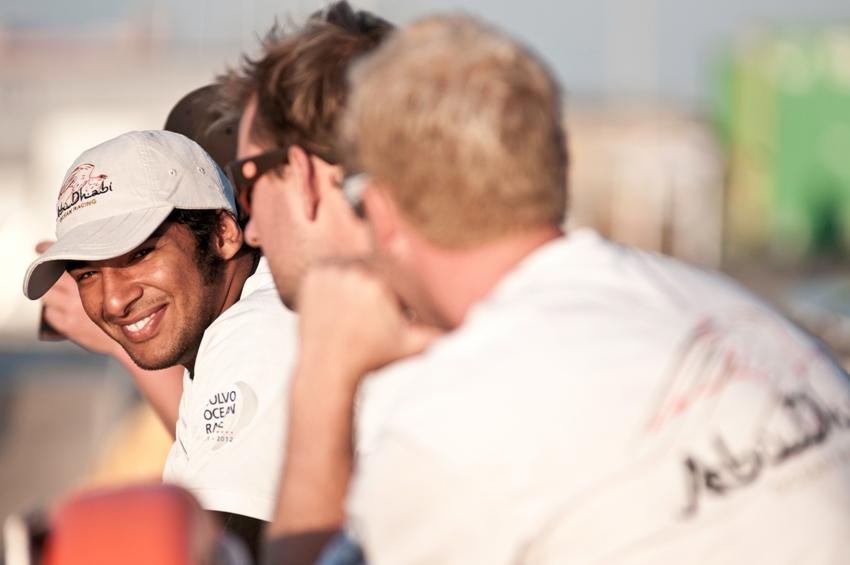 Abu Dhabi's Adil Khalid shares a joke with the shore team. Credit Tim Stonton/Volvo Ocean Race