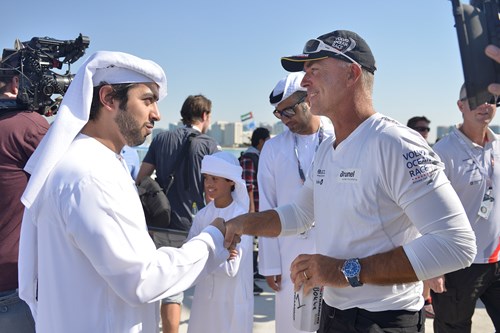 Caption 2 Sultan Al Dhaheri welcomes the victorious captain of Team Brunel, Bouwe Bekking, to Abu Dhabi.jpg