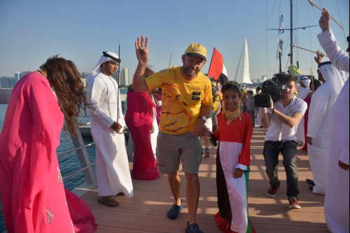 “Hi, so good to be back” says Walker as he’s escorted Emirati style up the Corniche Village jetty.jpg