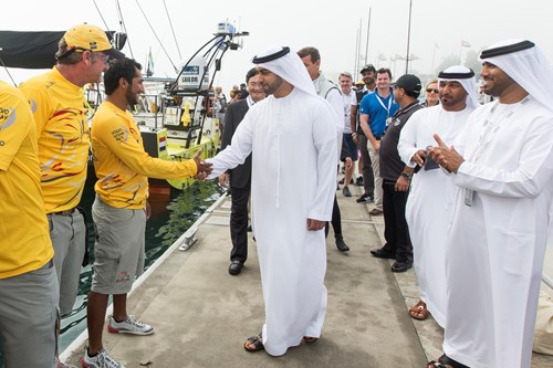 Sultan Al Dhaheri of Abu Dhabi Tourism & Culture Authority wishes Adil Khalid of ADOR well on the 4,200 nautical mile journey to China - Photo by Ian Roman.jpg