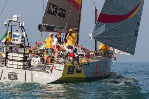 Jump4Azzam competition-winner Moritz Werb jumps from Azzam's stern - Photo by Ian Roman - Abu Dhabi Ocean Racing.jpg